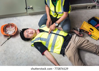 Position for using both hands compressions, Life-saving and rescue methods. Accident at work of electrician job or Maintenance worker in the control room of factory.