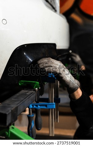 Positioning custom exhaust tips for performance tuning before full exhaust system installation.