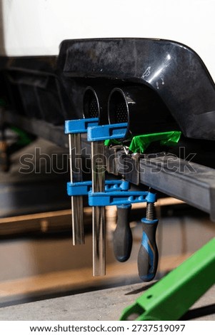 Positioning custom exhaust tips for performance tuning before full exhaust system installation.