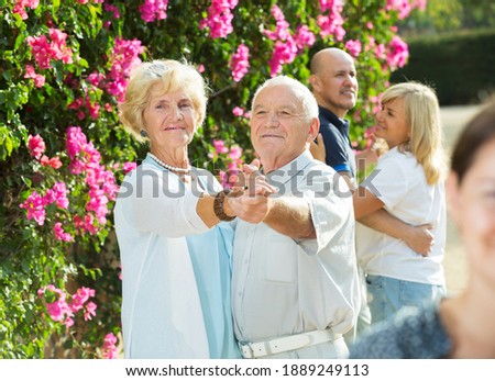 Similar – Senior woman in wheelchair laughing with her daughter