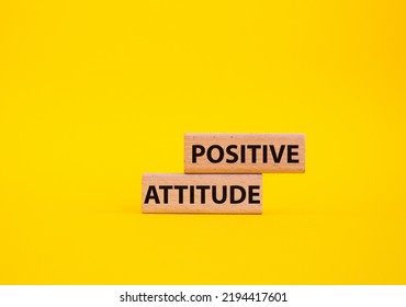 Positive Attitude Symbol. Concept Words Positive Attitude On Wooden Blocks. Beautiful Yellow Background. Business And Positive Attitude Concept. Copy Space.