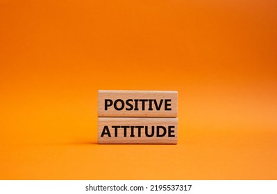 Positive Attitude Symbol. Concept Words Positive Attitude On Wooden Blocks. Beautiful Orange Background. Business And Positive Attitude Concept. Copy Space.