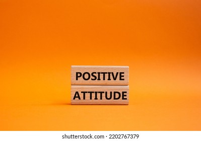 Positive Attitude Symbol. Concept Words Positive Attitude On Wooden Blocks. Beautiful Orange Background. Business And Positive Attitude Concept. Copy Space.