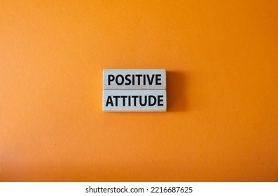 Positive Attitude Symbol. Concept Words Positive Attitude On Wooden Blocks. Beautiful Orange Background. Business And Positive Attitude Concept. Copy Space.