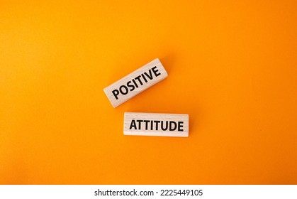 Positive Attitude Symbol. Concept Words Positive Attitude On Wooden Blocks. Beautiful Orange Background. Business And Positive Attitude Concept. Copy Space.