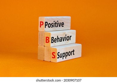 Positive behavior support symbol. Concept words Positive behavior support on wooden blocks on a beautiful orange background. Business, psychological and Positive behavior support concept. Copy space. - Shutterstock ID 2030907107