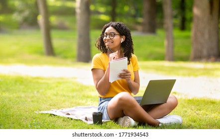 Positive Black Girl With Laptop Studying Online At Green Summer Park, Copy Space. Panorama