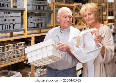 Positive Couple Elderly Customers Buying Storage Baskets In A Household Goods Store