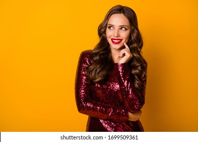 Positive dreamy sweet charming girl touch finger chin look copyspace think thoughts what present her boyfriend will give she wear trend glossy outfit isolated over bright color background