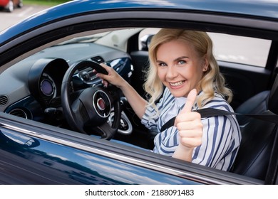 Positive Driver Showing Like Gesture During Driving Course In Car