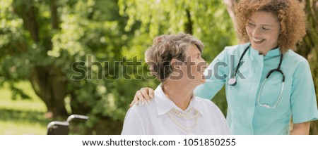 Similar – Senior dissatisfied woman in a wheelchair with her daughter