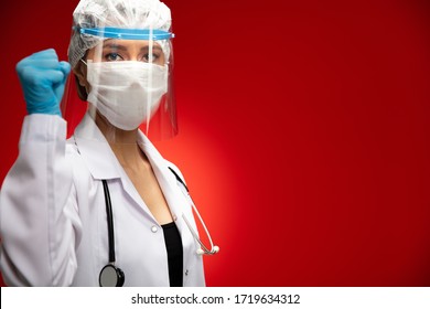 Positive emotion young woman doctor posing with visor mask.