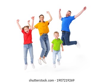 Positive Family: Couple And Kids Jumping With Outstretched Arms Above Ground In Studio On White Background While Having Fun And Celebrating Victory