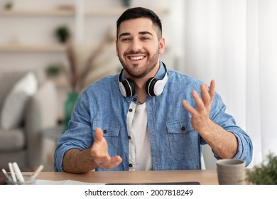 Positive Friendly Jewish Man Looking At Camera And Talking, Internet Teacher Tutor Having Virtual Lesson, Millennial Male Vlogger Speaking Making Video Call Vlog Or Online Job Interview At Home