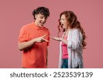 Positive funny couple playing rock paper scissors. Settling dispute method, decision. Rochambeau team games. High quality 