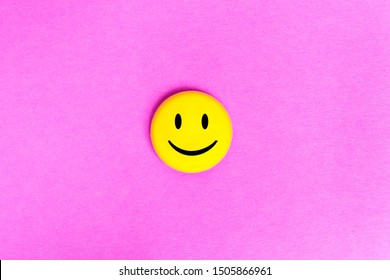 Positive Funny smiley face on a cardboard background. Copy space for advertising and texts