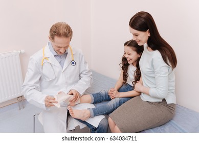 Positive Goofy Child Receiving Medical Treatment