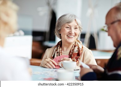 Positive granny with her friends