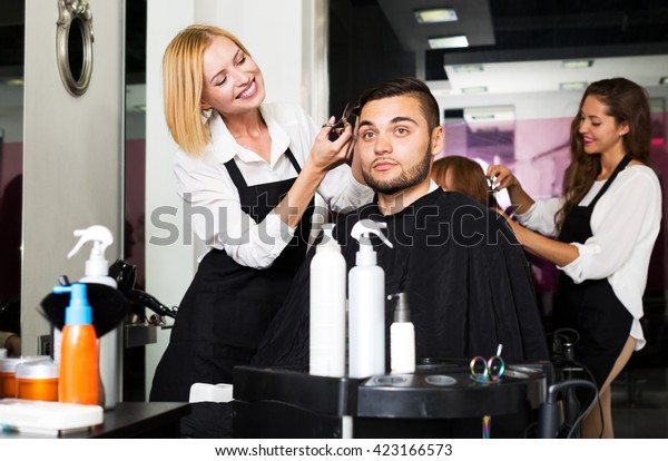 Positive Guy Cuts Hair Hair Salon Stock Photo Edit Now 423166573