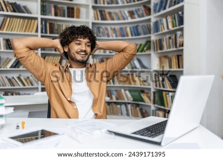 Similar – Image, Stock Photo Hispanic guy leaning on hand sitting against colorful illumination with opened mouth