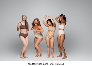 Positive Interracial Women In Underwear On Grey Background