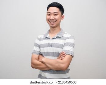 Positive Man Gentle Smile Standing Cross Arm Portrait