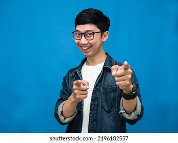 Positive Man Jeans Shirt Gesture Point Finger At You Blue Background