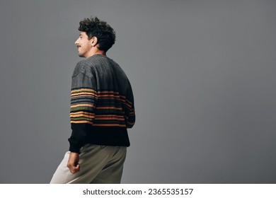 Positive man sweater trendy portrait hipster copyspace cool handsome face smile fashion expression - Shutterstock ID 2365535157
