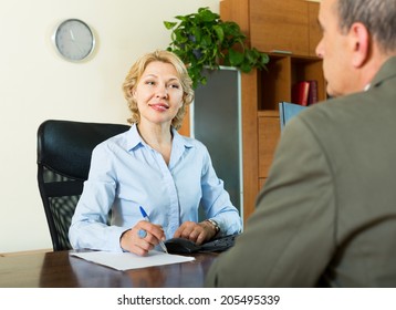 Positive Mature Man Opening Saving Account In Bank