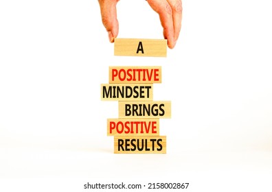 Positive Mindset Symbol. Wood Blocks With Words A Positive Mindset Brings Positive Results. Beautiful White Background Businessman Hand. Business Motivational Positive Mindset Concept. Copy Space.