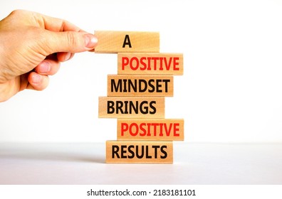 Positive Mindset Symbol. Wood Blocks With Words A Positive Mindset Brings Positive Results. Beautiful White Background Businessman Hand. Business Motivational Positive Mindset Concept. Copy Space.