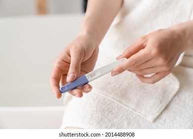 Positive Negative Pregnancy Test Result. Abortion, Adoption, Invitro Fertilization Concept. Woman Holding Pregnancy Test. Maternity, Motherhood Concept