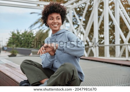 Similar – Image, Stock Photo Young african american woman web-surfing internet