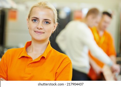 Positive Sales Assistant Portrait In Home Appliance Shop Supermarket Store