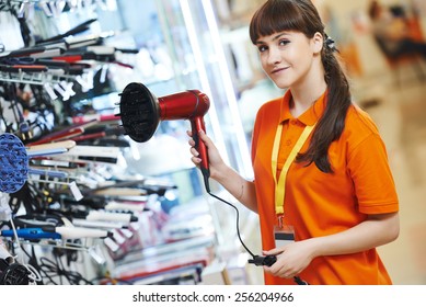 Positive Shop Assistant In Home Electric Appliance Supermarket Store