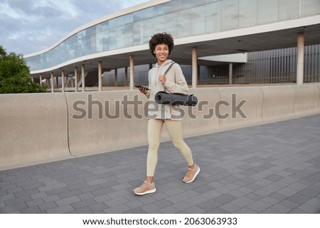 Similar – Image, Stock Photo beautiful caucasian woman walking with her cute brown poodle on the road. Pets and lifestyle outdoors