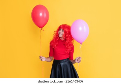 Positive Teen Kid With Party Balloon On Yellow Background