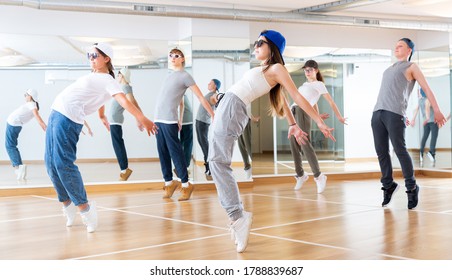 Positive Teenage Girls And Boys Training Hip Hop In Dance Studio, Dance Classes For Teens