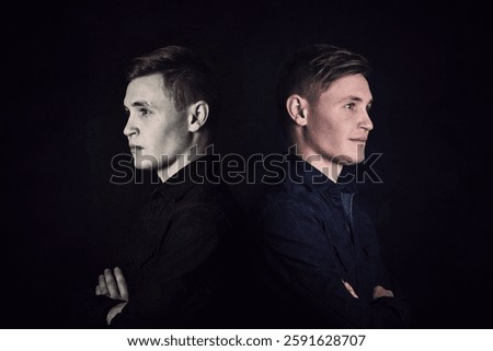 Positive vs negative energy, split personality metaphor. Twins with different emotions standing back to back, pessimist against optimist. Bipolar disorder concept