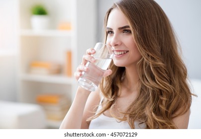 Positive Woman Drinking Water