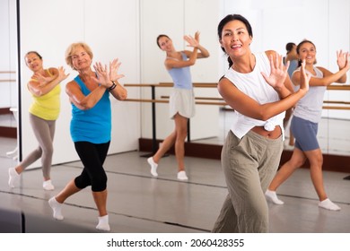 Positive Women Of Different Ages Dancing Strip Plastic In A Dance Class