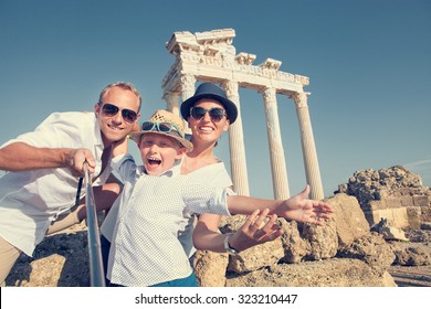 Positive Young Family Take A Selfie Photo Near Antique Colonnade