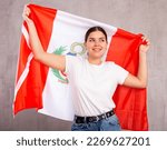 Positive young girl with Peru flag rooting for your favorite team