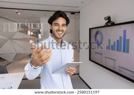 Similar – Image, Stock Photo Male hand comes out of a pile of leaves. Concept fall fun