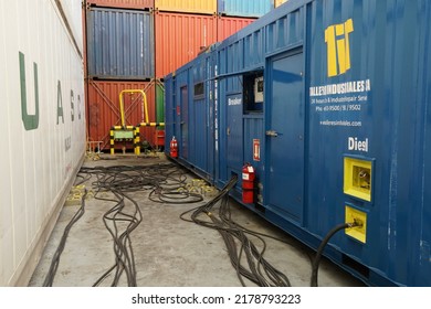 Posorja,  Ecuador - 06 26 2022: Blue Power Pack With Cables Or Portable Generator For Supply Of Electricity To The Reefers On Deck Of Container Vessel Passing Through Ocean.