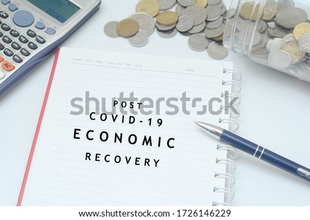 Post covid-19 economic recovery conceptual. Top view of an image with 'POST COVID-19 ECONOMIC RECOVERY