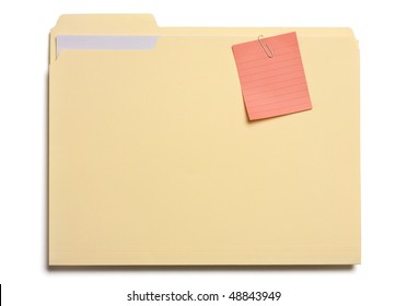 Post Note Clipped On A File Folder Isolated On White.