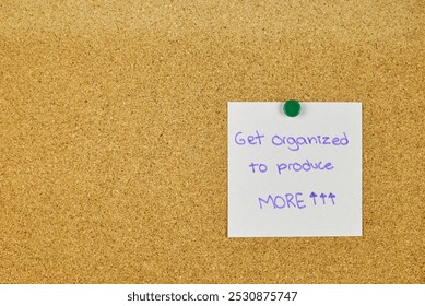 Post It notes with resolutions and goals achieved, placed on the cork board at the foot of a desk - Powered by Shutterstock