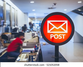 Post Office Signage Counter Service With People Working