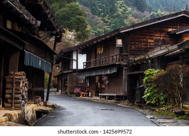 Post Preserved Old Town Of Tsumago Juku Of The Nakasendo , Kiso Valley District, Nagano. Wooden Buildings Have Old Late Evening.